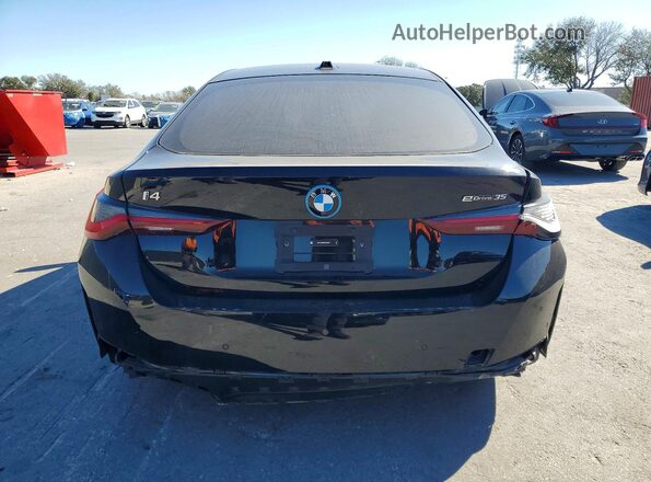 WBY43AW02RFS33974 2024 BMW I4 Black Rear view