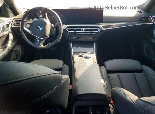 WBY43AW02RFS33974 2024 BMW I4 Black Dashboard view