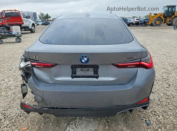 WBY43AW06PFP45038 2023 BMW I4 Gray Widok z tyłu