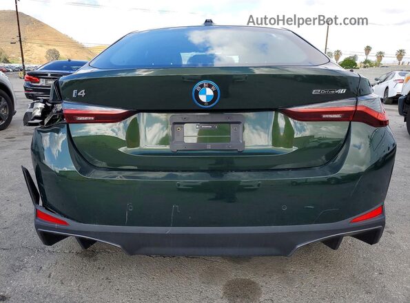 WBY73AW07RFT33632 2024 BMW I4 Green Вид ззаду