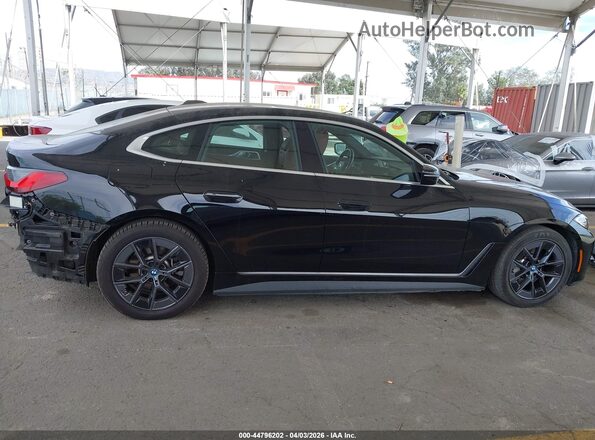WBY73AW08PFP89703 2023 BMW I4 Black Панорамний вид салону 360°
