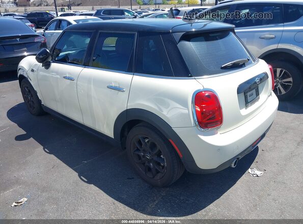 WMWXU7C07L2M38768 2020 MINI HARDTOP Beige Trasero izquierdo
