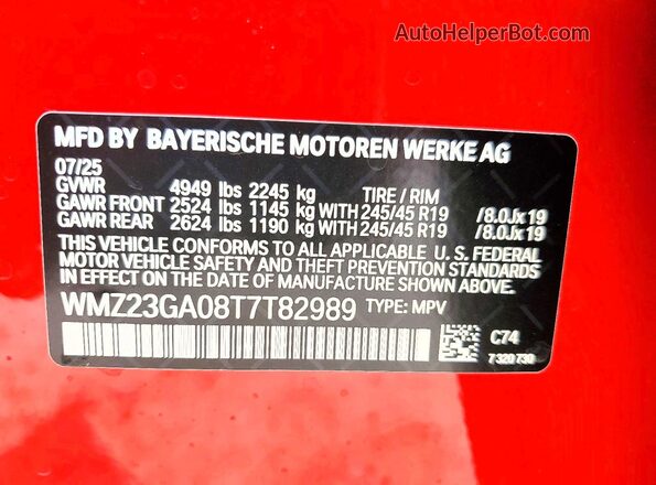 WMZ23GA08T7T82989 2026 MINI COUNTRYMAN Red Widok naklejki z numerem VIN