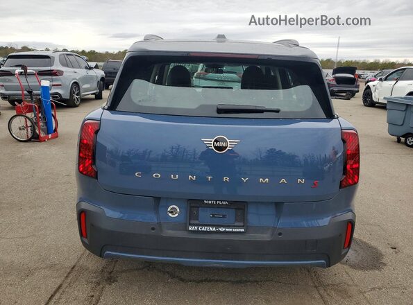 WMZ23GA09S7S03499 2025 MINI COUNTRYMAN Синий Вид сзади