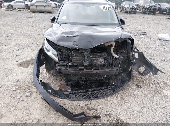 WVGAV7AX3GK000076 2016 VOLKSWAGEN TIGUAN Black Front view