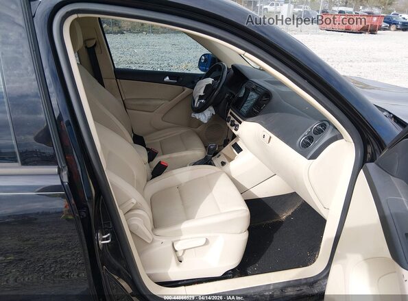 WVGAV7AX3GK000076 2016 VOLKSWAGEN TIGUAN Black Front interior view
