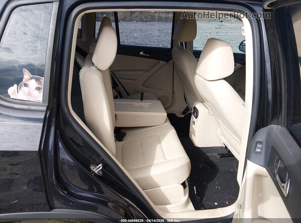 WVGAV7AX3GK000076 2016 VOLKSWAGEN TIGUAN Black VIN sticker view