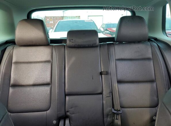 WVGJV7AX4GW013007 2016 VOLKSWAGEN TIGUAN White Vista de los asientos traseros