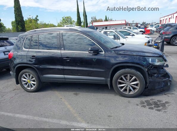 WVGRV7AX5HW507008 2017 VOLKSWAGEN TIGUAN Black Սալոնի հետևի տեսք