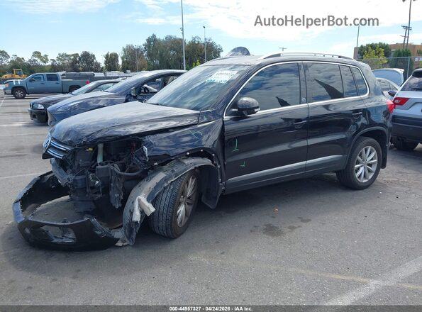 WVGRV7AX5HW507008 2017 VOLKSWAGEN TIGUAN Black Առջևի ձախ երեք քառորդ տեսարան