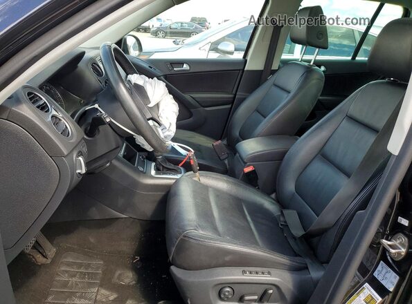 WVGTV7AX3HW511662 2017 VOLKSWAGEN TIGUAN Черный Вид салона спереди