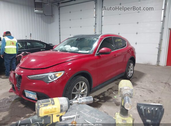 ZASPAKBN6K7C57147 2019 ALFA ROMEO STELVIO Tan Vista tres cuartos delantera izquierda