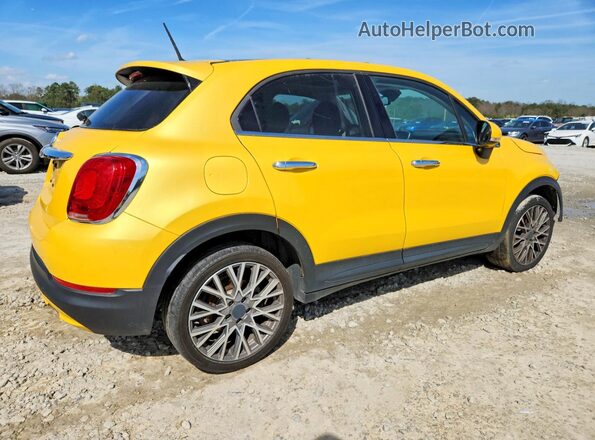 ZFBCFXDB7HP589232 2017 FIAT 500X Желтый Задняя правая четверть