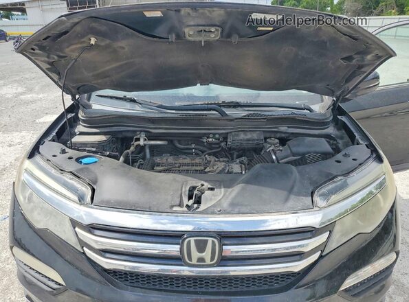 5FNYF6H99GB115148 2016 HONDA PILOT Black Вид задньої частини салону