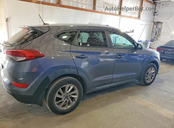 KM8J33A47GU207420 2016 HYUNDAI TUCSON Gray 