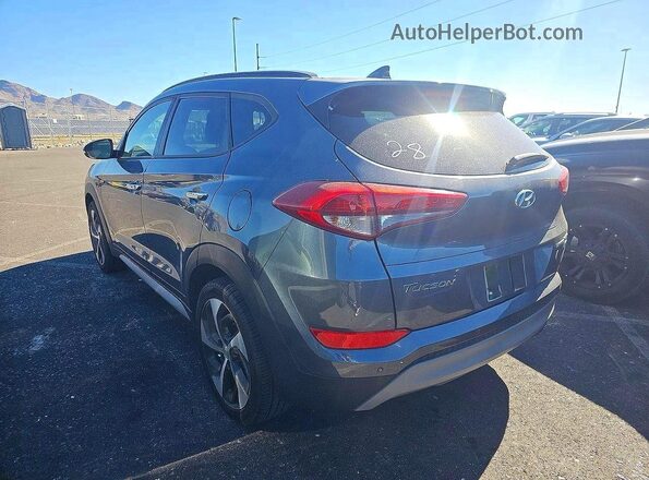 KM8J3CA23JU753508 2018 HYUNDAI TUCSON Gray 