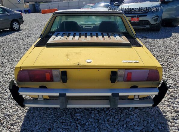 128AS0055503 1976 FIAT UK Yellow Вид ззаду