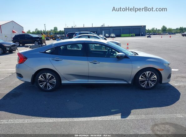 19XFC1F30GE030643 2016 HONDA CIVIC Серебряный Вид задней части салона
