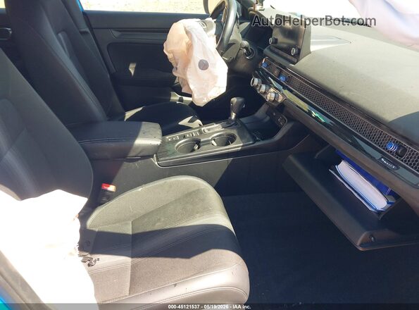 19XFL2H84PE016047 2023 HONDA CIVIC Blue Front interior view