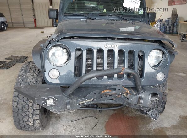1C4BJWDG3GL220872 2016 JEEP WRANGLER UNLIMITED Gray Widok z przodu