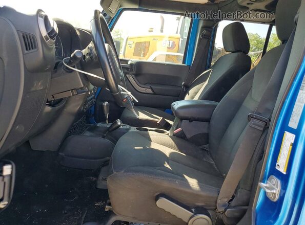 1C4BJWDG7GL247699 2016 JEEP WRANGLER Blue Vista interior delantera