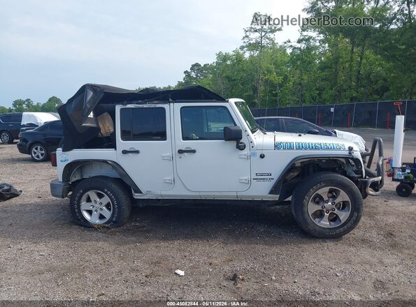 1C4HJWDG3GL246947 2016 JEEP WRANGLER UNLIMITED White Rear interior view