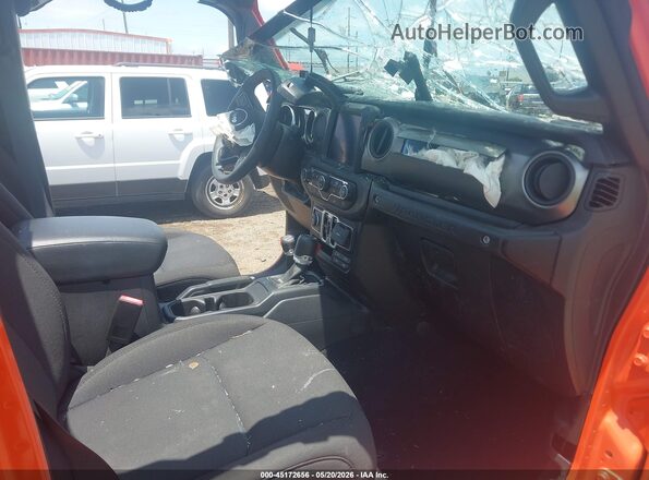 1C4HJXDG4PW647069 2023 JEEP WRANGLER Orange Vista interior delantera