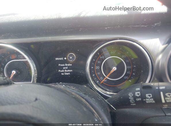 1C4HJXDG4PW647069 2023 JEEP WRANGLER Orange Vista de los asientos traseros