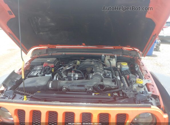 1C4HJXDG4PW647069 2023 JEEP WRANGLER Orange Vista trasera