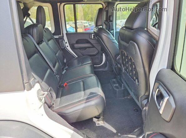 1C4HJXFG7KW607705 2019 JEEP WRANGLER Белый Вид задней части салона