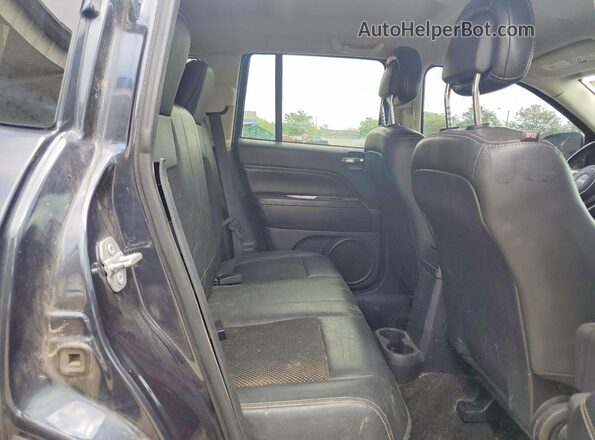 1C4NJCEA5GD543255 2016 JEEP COMPASS Black Rear interior view