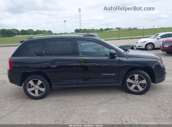 1C4NJCEAXGD776595 2016 JEEP COMPASS Черный Вид задней части салона