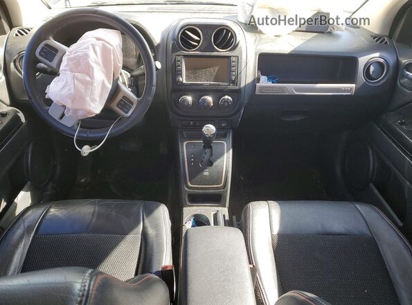 1C4NJDBB0GD707479 2016 JEEP COMPASS Серый Вид панели приборов