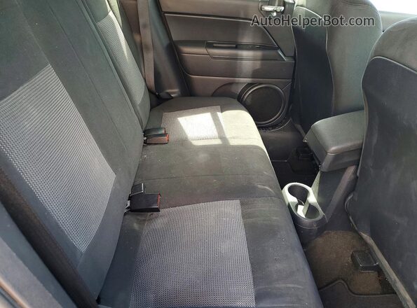 1C4NJDBB4GD500870 2016 JEEP COMPASS Black Vista interior trasera