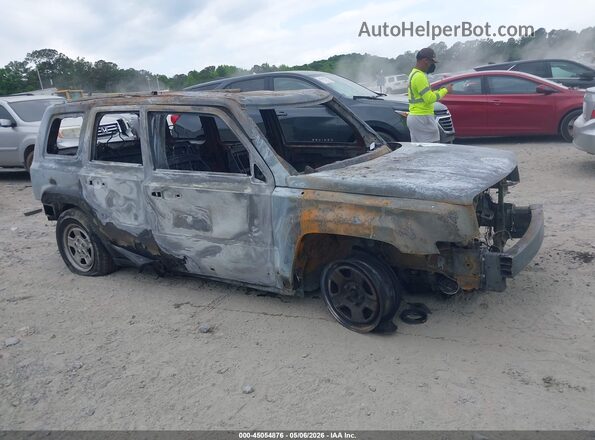 1C4NJPBA2GD670105 2016 JEEP PATRIOT Черный Вид задней части салона