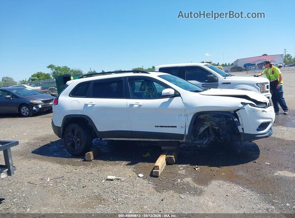 1C4PJMLB0MD105619 2021 JEEP CHEROKEE White Vista interior trasera