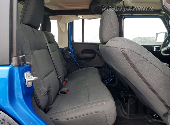 1C4PJXDNXTW156672 2026 JEEP WRANGLER Blue Widok wnętrza z tyłu