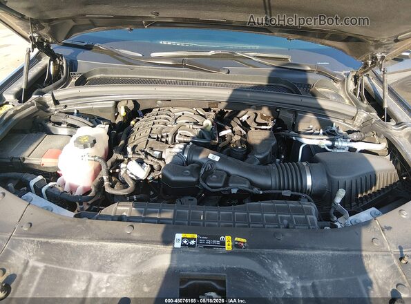1C4RJHAG7SC282878 2025 JEEP GRAND CHEROKEE Gray Rear view