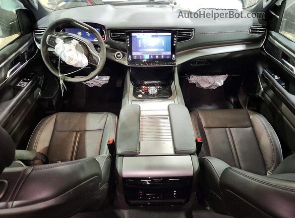 1C4SJSBP4TS163772 2026 JEEP GRAND Black Dashboard view