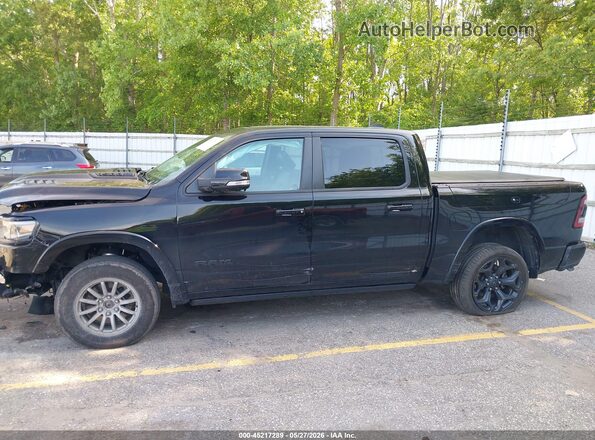 1C6SRFHT5MN749747 2021 RAM 1500 Black Rear interior view