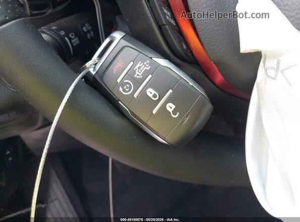 1C6SRFLP4SN761086 2025 RAM 1500 Red Dashboard view