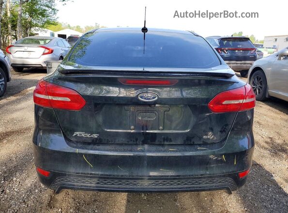 1FADP3F23HL265826 2017 FORD FOCUS Black Widok z tyłu