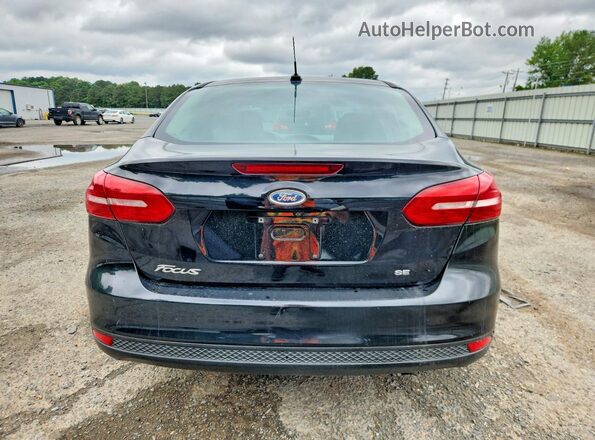 1FADP3F23JL272572 2018 FORD FOCUS Black 