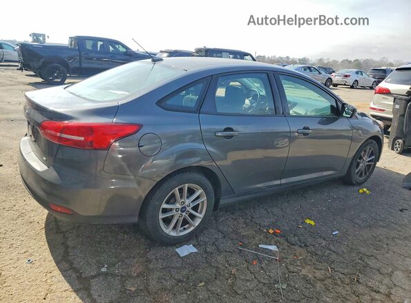 1FADP3F24JL207195 2018 FORD FOCUS Charcoal Trasero derecho