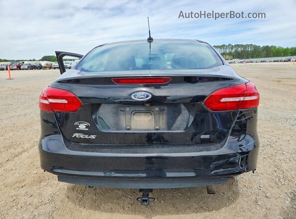 1FADP3F25JL298932 2018 FORD FOCUS Black Vista trasera