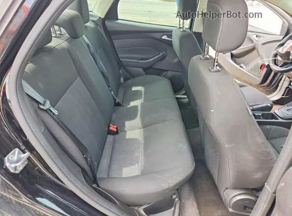 1FADP3F25JL298932 2018 FORD FOCUS Black Vista de los asientos traseros