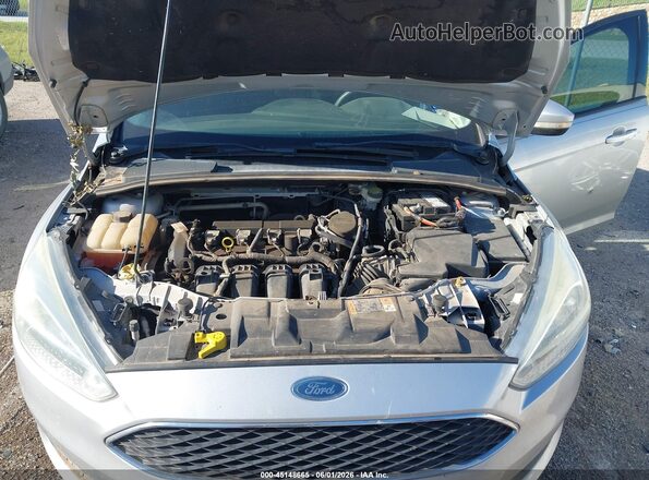 1FADP3F26GL284711 2016 FORD FOCUS Серебряный Вид сзади