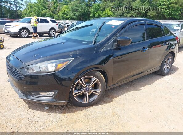1FADP3F27JL307078 2018 FORD FOCUS Black Front left
