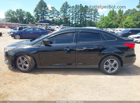 1FADP3F27JL307078 2018 FORD FOCUS Black Front view
