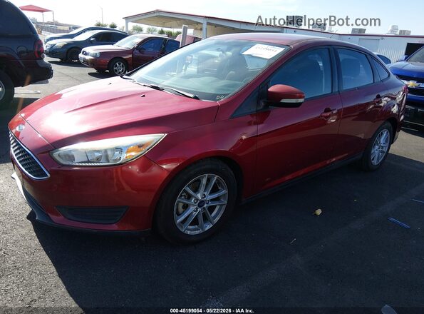 1FADP3F29HL303950 2017 FORD FOCUS Maroon Vista tres cuartos delantera izquierda